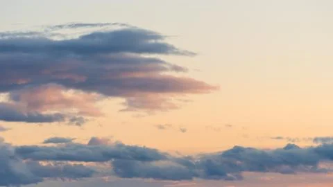 Beautiful tender dramatic sunset clouds on sky background Stock Photos