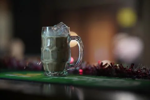 Beautiful texture and layers of Nitro Cold Coffee served in a double wall glass Stock Photos
