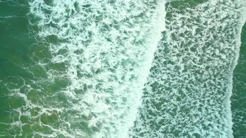 Beautiful texture of big power dark ocean waves with white wash. Aerial top view Stock Footage 231053693