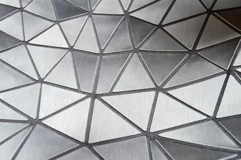Beautiful texture of black carved patterned beautiful triangles with rounded  Stock Photos