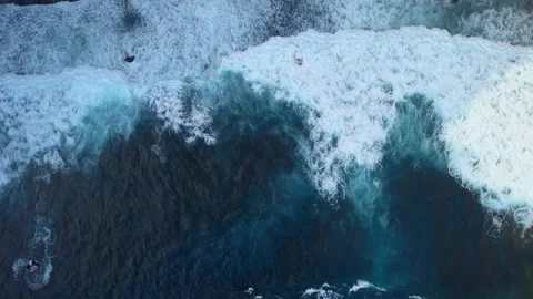 Beautiful texture of dark ocean waves with white foam. Drone filming breaking Video stock 217814007