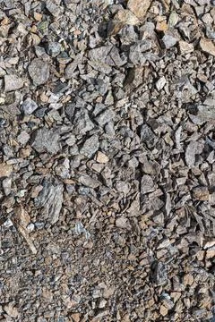 A beautiful texture of gray broken stone. Vertical Stock Photos