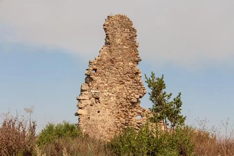 Beautiful texture of a part of old wall from orange stones with cracks Stock Photos