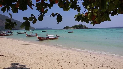 Beautiful Thai Beach. Long Tail boats at the beach. Thailand. Stock Footage 78711548