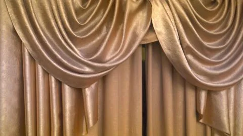 Beautiful theater curtain in gold color Stock Photos