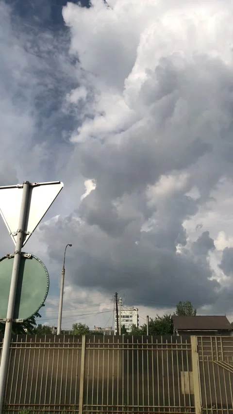 Beautiful thick clouds in the city Stock Footage 159235495