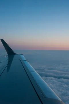Beautiful thick clouds in the sky from the height of the flight of the plan.. Stock Photos