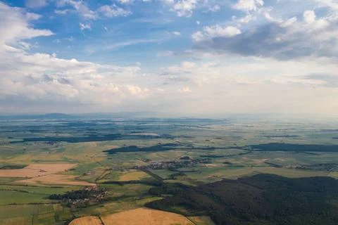 Beautiful thick clouds in the sky from the height of the flight of the plan.. Stock Photos