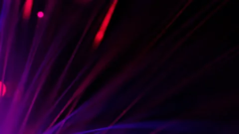Beautiful thin glowing sticks in close-up on a black background Stock Footage 159463899