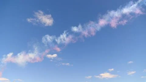 Beautiful three colored clouds on a blue sky. Foto stock