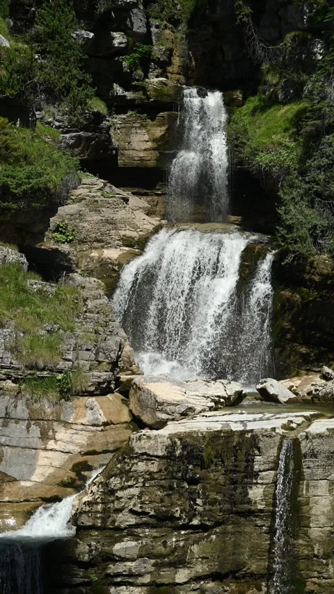 Beautiful threefold waterfall in summer, vertical shot Video stock 260869542