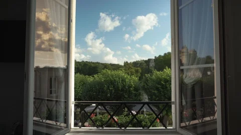 Beautiful tilt through window to reveal summer morning in France Stock Footage 119536652