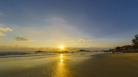 Beautiful time lapse at the beach during sunrise. Stock Footage 105689332