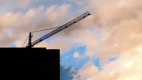 Beautiful Time Lapse of Big Crane above Building at Construction Site, Clouds 스톡 동영상 248349244