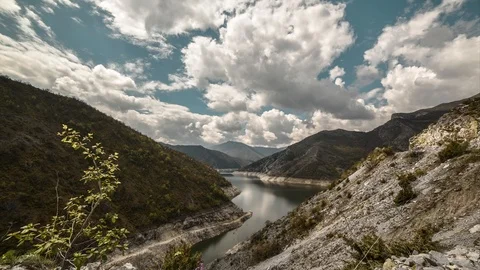 Beautiful time lapse of clouds above a lake. Landscape from a mountain Kozjak 库存影片 106784056