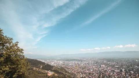 Beautiful time lapse of clouds above a city. Landscape from a mountain Vodno 库存影片 106784087