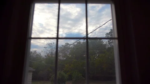 Beautiful Time-lapse looking out of a window 스톡 동영상 90310496