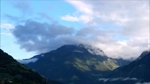 Beautiful time lapse of moving clouds over the Ziel peak near Merano, Italy. Stock Footage 133449878