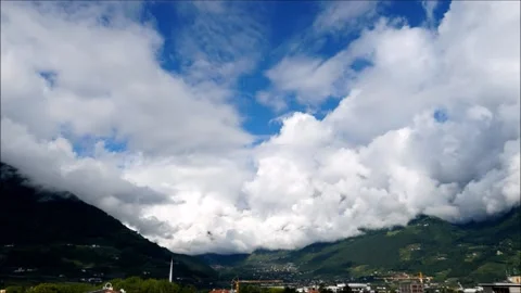 Beautiful time-lapse of moving clouds over the Ziel peak, near Merano, Italy. Stock Footage 138554500