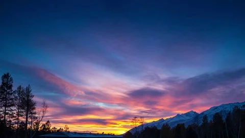 Beautiful time lapse of the nightfall at the mountains. Amazing sunset and sky Stock Footage 73686499