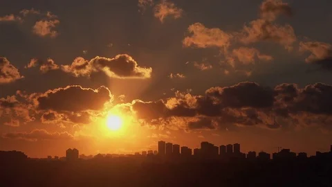 Beautiful time lapse sunset on the cloudy sky Stock Footage 79190376