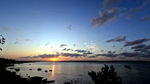Beautiful time lapse of a sunset in a lagoon. Vacation tropical landscape. Stock Footage 221553517
