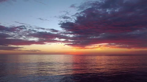 Beautiful time lapse of a sunset over the ocean in 4K Stock Footage 283272698