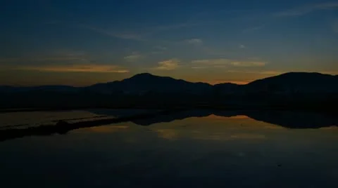 Beautiful time lapse sunshine and reflection in pond Stock Footage 21219741