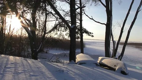 Beautiful timelaps with sunset at winter lake Stock Footage