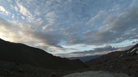 Beautiful Timelapse of the clouds flowing over the mountains. Stock Footage 125067189