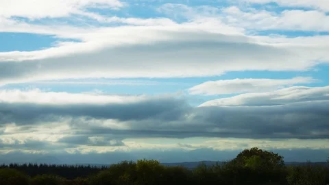 Beautiful Timelapse Of Clouds Rolling Over Field On Sunny Day Stock Footage 70805376