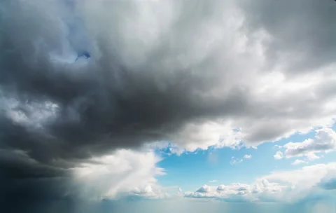 Beautiful timelapse of cumulus clouds moving away on bright blue sky. Stock Footage 134354964