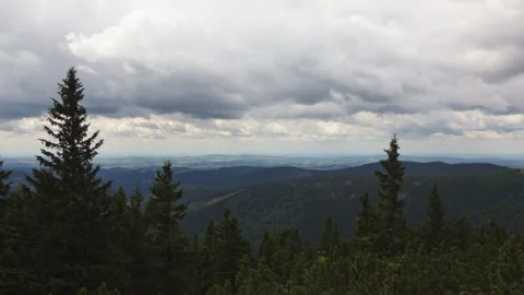 Beautiful timelapse of dramatic storm clouds moving over the valley and pin.. Stock Footage 340457190