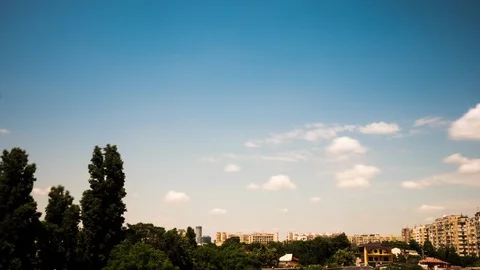 Beautiful timelapse of fast moving clouds over the city Stock Footage 92474149