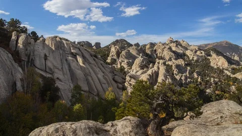 Beautiful Timelapse of fast moving clouds above City of Rocks in Idaho Stock Footage 128377512