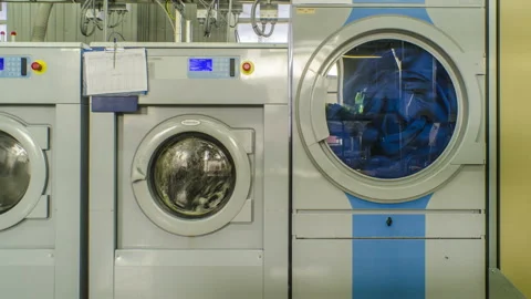 Beautiful timelapse on the process of industrial dry cleaning Stock-Footage 129514023