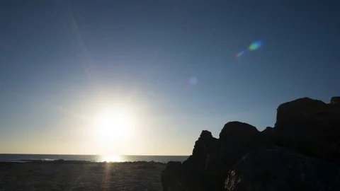 Beautiful Timelapse Shot Of Sun Setting At Beach Against Sky Stock Footage 70797606