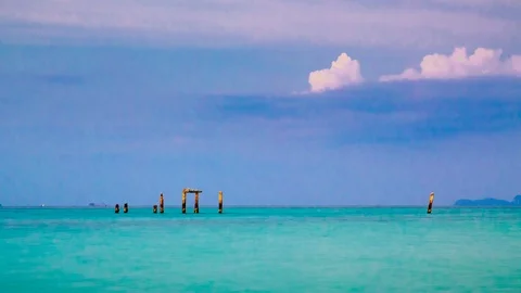 Beautiful timelapse of a sunset over crystal clear turquoise water in the Stock Footage 100576282