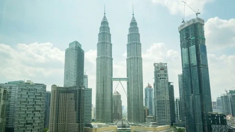 Beautiful timelapse video with cloudscape view of the Petronas Twin Towers and Stock Footage 81083918
