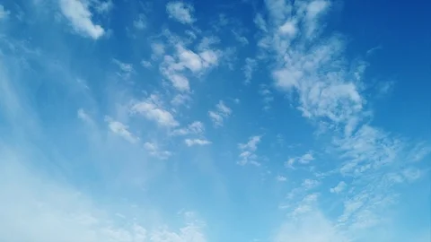 Beautiful timelapse of white cirrocumulus clouds in a beautiful summer blue sky Stock Footage 108253987