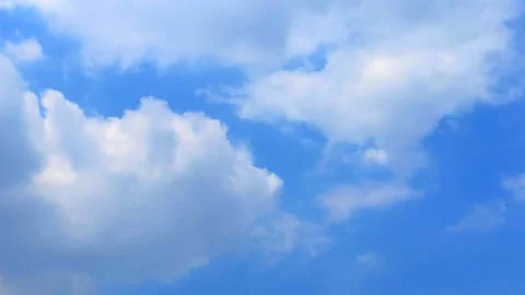 Beautiful timelapse white clouds floating in the summer blue sky background Stock Footage 150222372