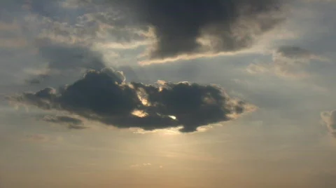 Beautiful timelapsed clouds slowly drift against the sun (High Definition) Stock-Footage 67822
