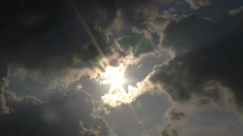 Beautiful timelapsed clouds slowly drift against the sun (High Definition) Video stock 68077