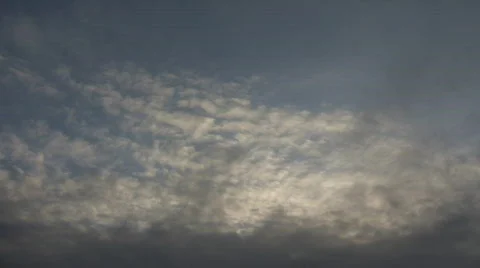 Beautiful timelapsed clouds slowly drift along at dusk (High Definition) Stock Footage 69050