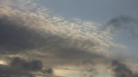 Beautiful timelapsed clouds slowly drift along at sunset (High Definition) Stock-Footage 69055