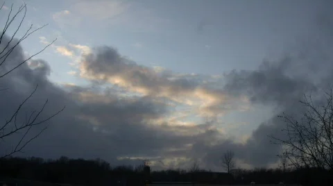 Beautiful timelapsed clouds slowly drift along at dusk (High Definition) Stock Footage 69063