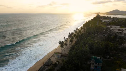 Beautiful top view over Butre beach. Coast landscape in Ghana next to Cape Coast Stock Footage 128066100