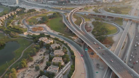 Beautiful top view of road junctions in the Emirates at sunset Stock Footage 96989443