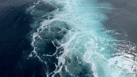 Beautiful trace of ferry boat engine. Yacht voyage POV. Texture of blue ocean Video stock 238736930