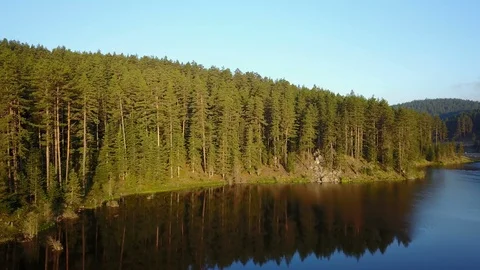 Beautiful Tranquil River Coast Reflection Pine Forest Hill Drone View Stock Footage 119889574